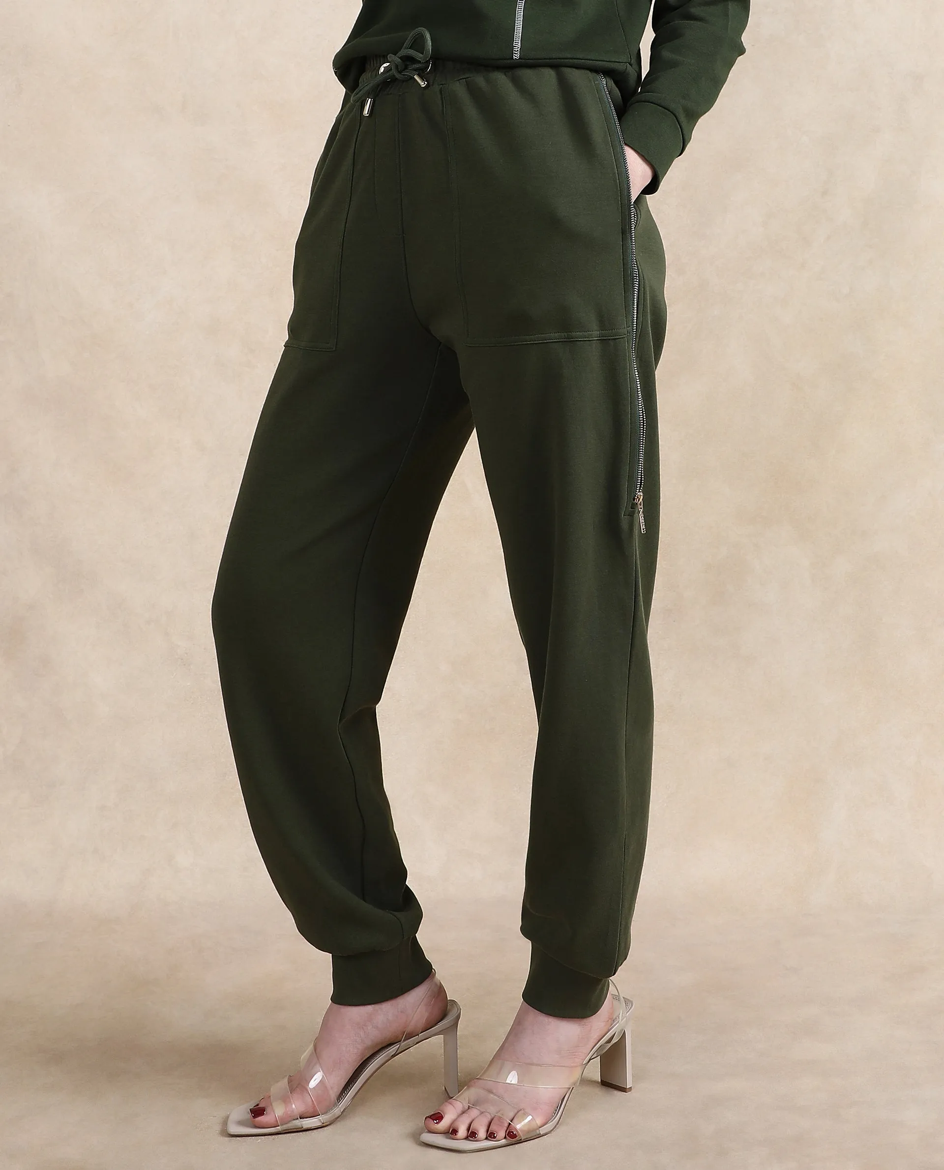 Rareism Women Saints Olive Cotton Blend Fabric Ankle Length Plain Track Pant